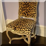 F14. Leopard print side chair. 